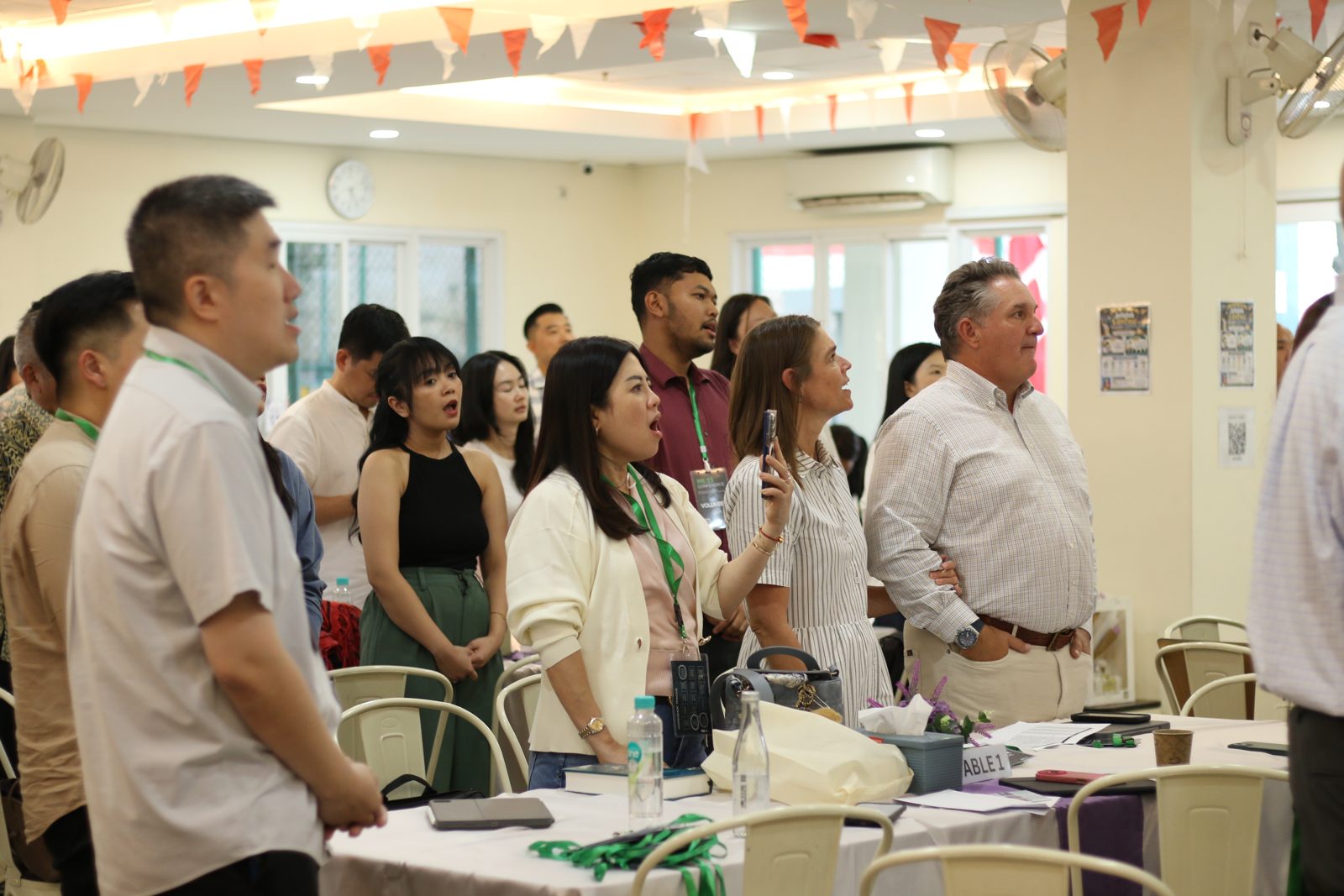 The room gathered together during the cohort celebration