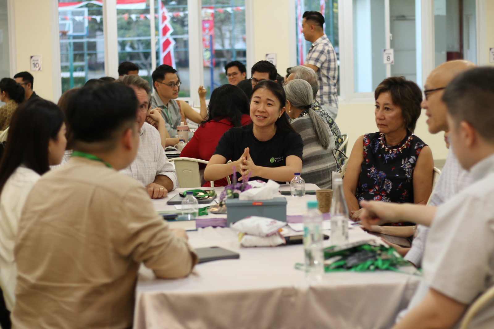 Guests around a table during the cohort gathering