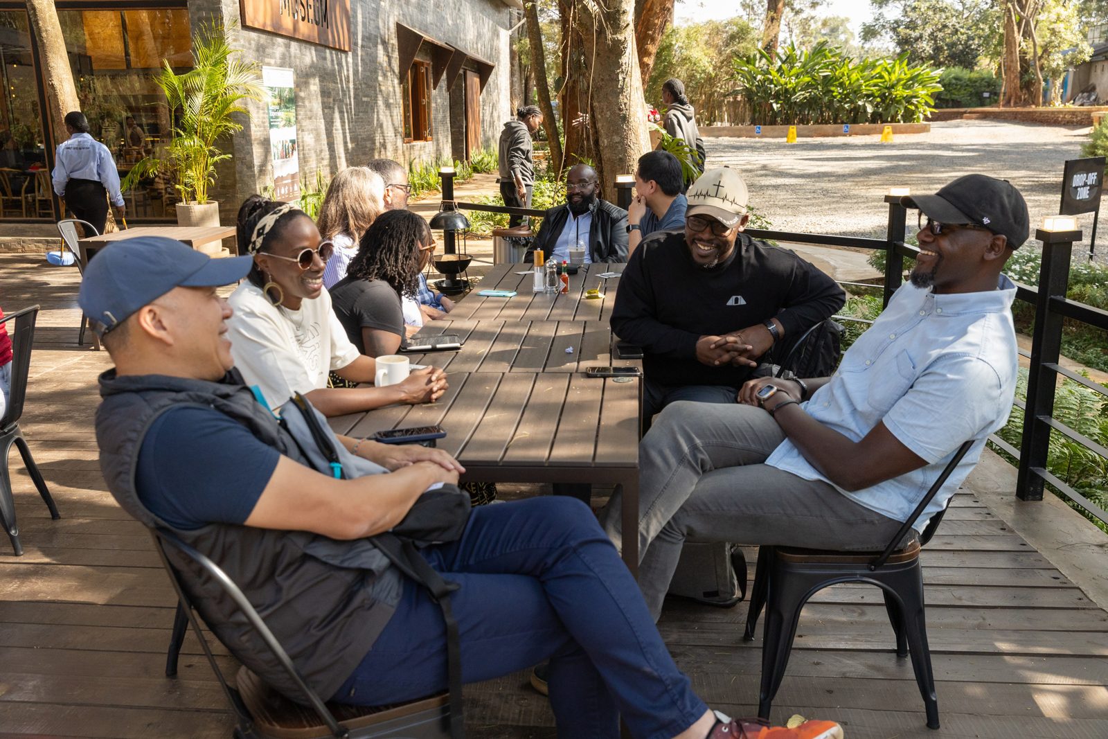 The team together on a deck