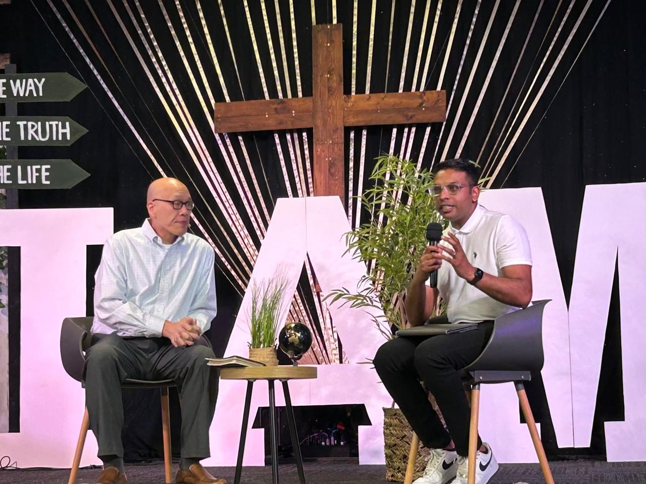 Two leaders in conversation on stage